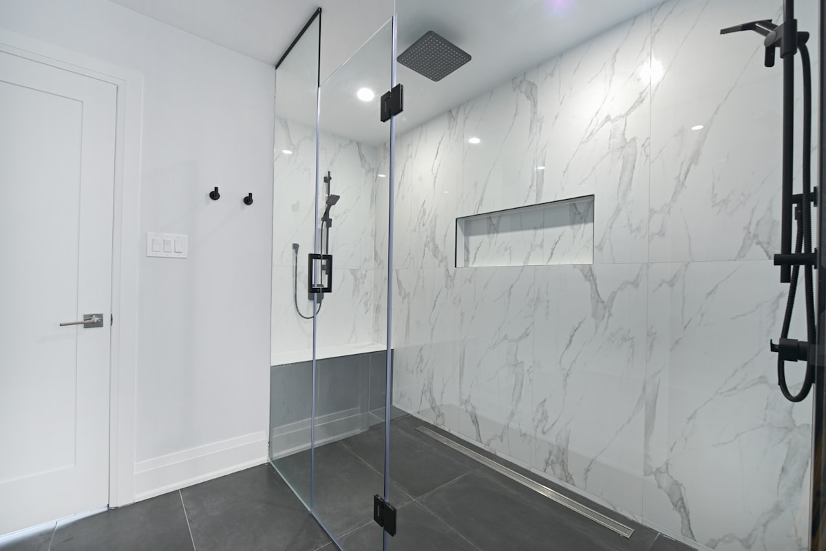 Revitalizing the Home with Modern Retiling Bathroom Shower Projects